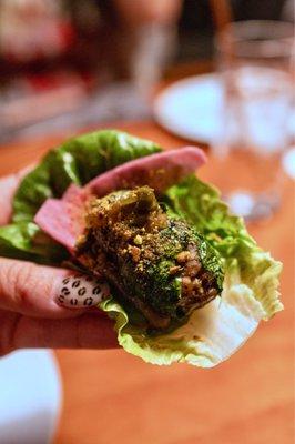 Bò Lá Lốt - Wagyu beef, betel leaf, mắm nêm, little gem, mint, cucumber, charred scallion relish, pistachio, rau ram, pickled radish