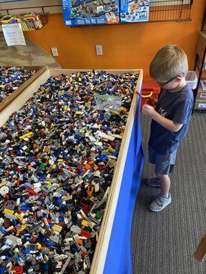 One of the two LEGO tables that allows you to find random pieces you may be needing.