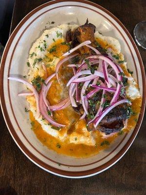 Chamorro Adobado, pork shank with mashed potatoes