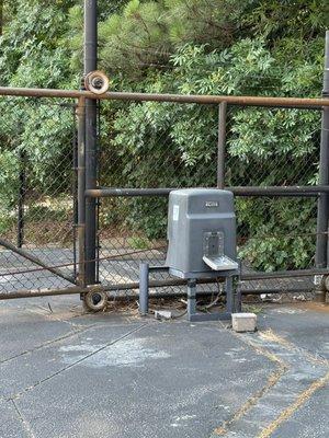 The gate mechanism located in the second storage unit property appears tampered with.