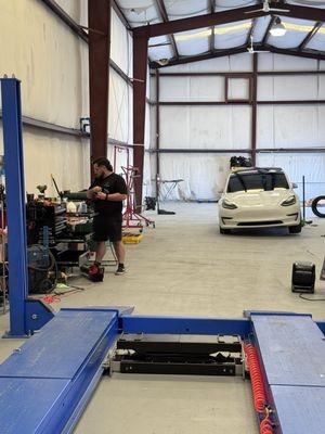 Hunter Alignment Rack, rim and tire maintenance on a Model 3