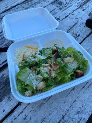 Caesar salad, nice that the dressing is on the side.