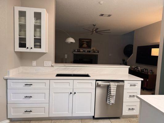 Kitchen sink and dishwasher area