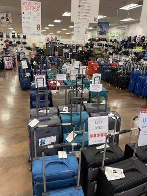 100's of pieces of luggage in stock