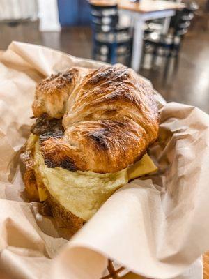 Croissant breakfast sandwich.