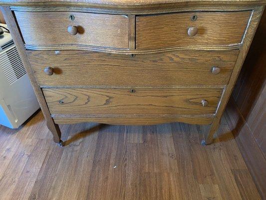 Old small dresser in bedroom