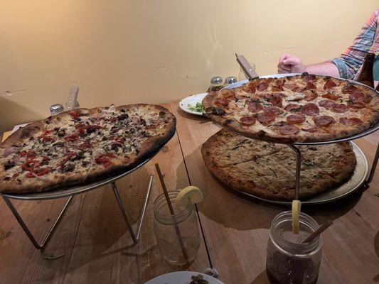 Three different large pizzas