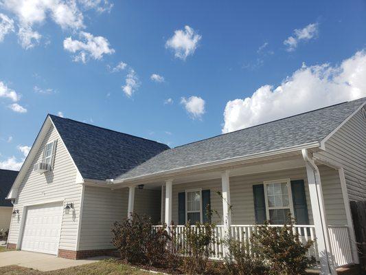 Front of the house. High pitched roof