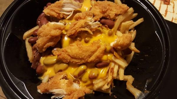 Doesn't look like much but this is good stuff and i always do weird things to my S&S food so i added chicken tenders lol