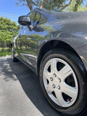 Side view of car with tires