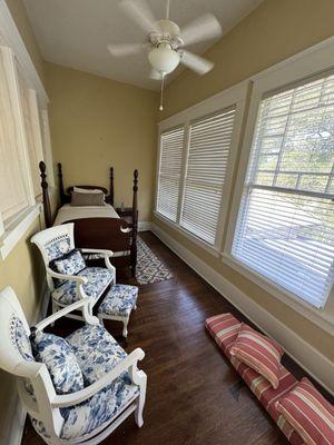 skinner room - extra bed and seating area in sun room