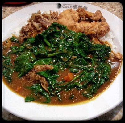 Kalbi with fried chicken and spinach.