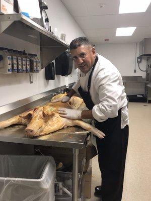 The chef with the hog.