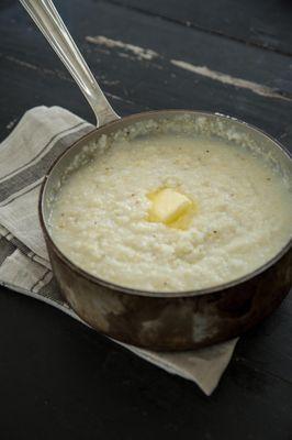 Callie's Hot Little Biscuit slow cooker grits. Southern staple topped with butter. Perfect for Charleston-style shrimp and grits.