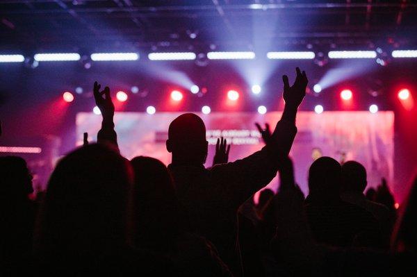 People worshipping Jesus at Christ Fellowship Church in Royal Pam Beach, FL