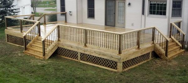 36'x20' Treated deck with Deckorator black colonial style aluminum balusters andd lattice skirting built in Uniotown, Ohio.