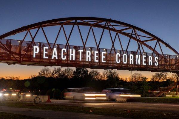 City's pedestrian bridge at Town Center connects with its 'Corners Connector' multi-use trail system.