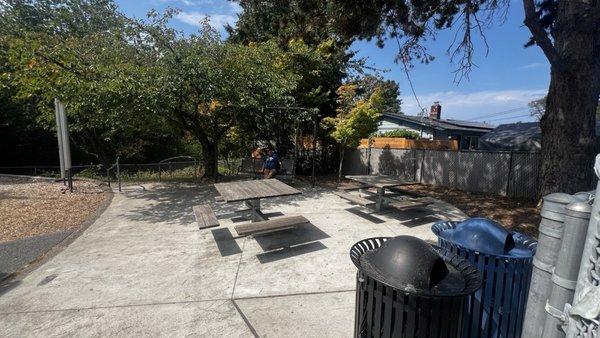 Clean and new picnic tables, w/ a bench swing in the back