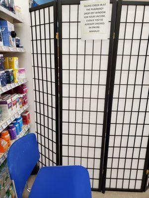 Pharmacy offers waiting area for vaccinations