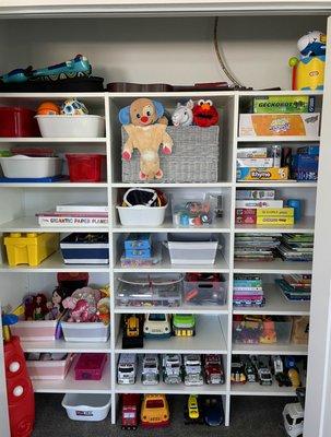 Simple adjustable shelving transforms an ordinary space into extraordinary toy storage