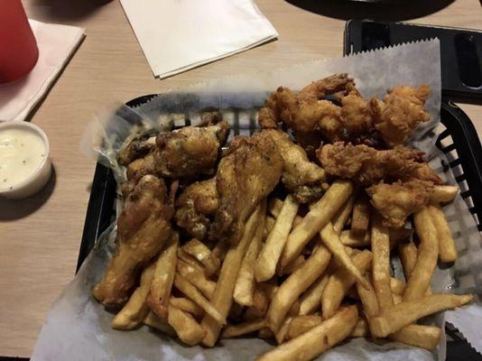 Lemon pepper wings, shrimp and fries.