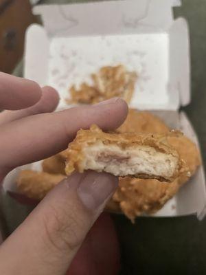 Uncooked chicken nugget