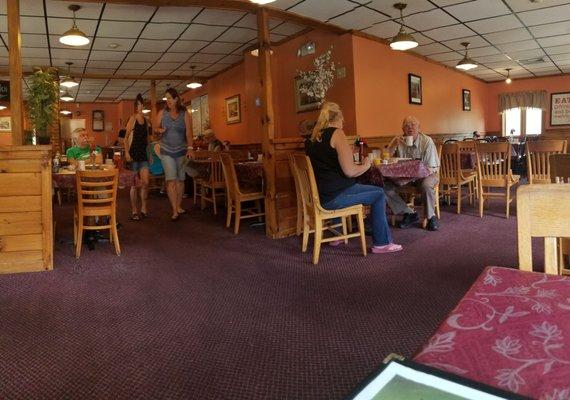 Main dining room is bright and inviting... a nice place for a casual cup of coffee with friends.