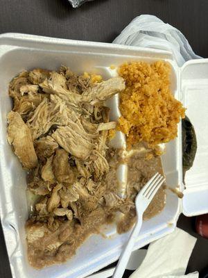 Carnitas with rice and beans.