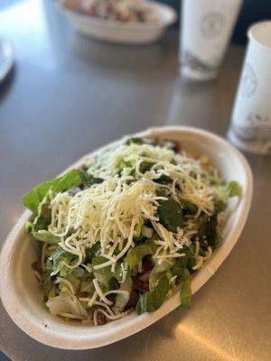 Steak bowl (w/ lettuce, black beans, pico de gallo, and cheese pictured here)