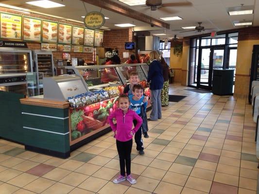 Interior view of Subway shop. Very clean.