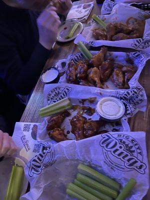 Large tray of celery, followed by chipotle bbq, honey bbq and spicy ranch (a dry rub)