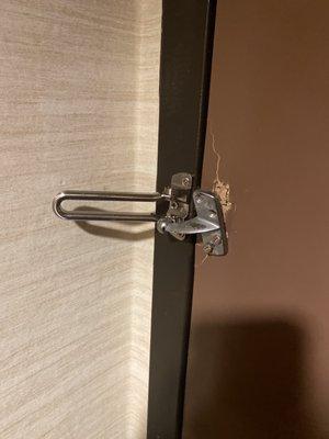 - Security lock damaged, it appears that  someone tried to kick in the door.