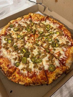 Large pizza with jalapeños and sausage