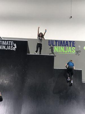 My daughter tried and tried to get up the 12 foot wall and with Cam's coaching and encouragement she made it!