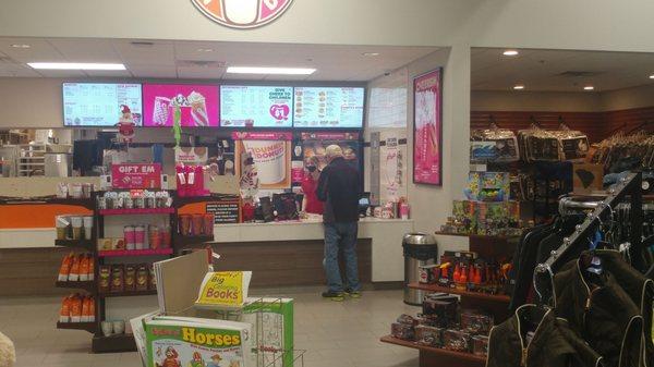 walking in through the car entrance looking to the left on the wall the dunkin' donut franchised area of the Sapp Brothers truck stop.