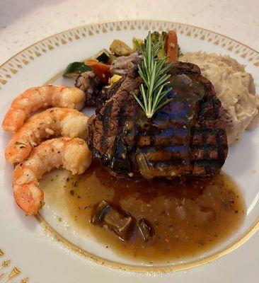 Seared filet with garlic butter shrimp, garlic mashed potatoes, and roasted veggies. Super tender and delicious flavors!