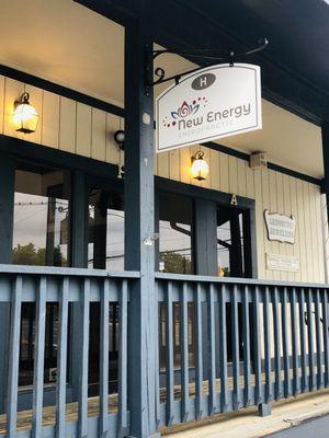 New Energy Chiropractic sign in front of the entrance door.