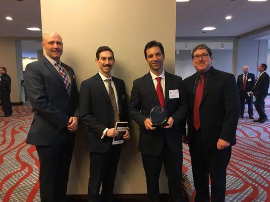 Brandon Wesley, Max Wechter, Derek Tye and Rob Sheil receiving an award at the Cincinnati Area Board of Realtors Circle of Excellence Lunch