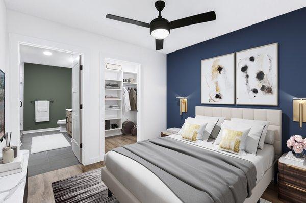 Large bedrooms featuring wood-inspired plank flooring, large walk-in closets and custom built-in shelving