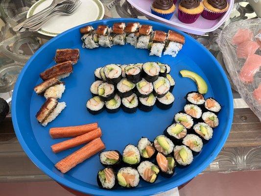 Made California rolls, salmon and avocado rolls, unagi nigiri and dragon rolls