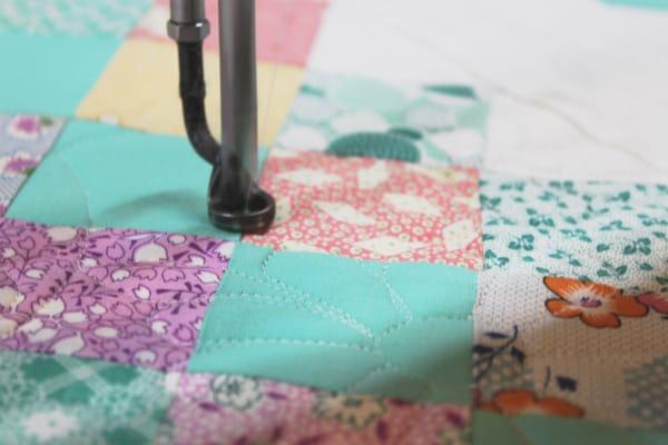 I like the quilting to complement the piecing