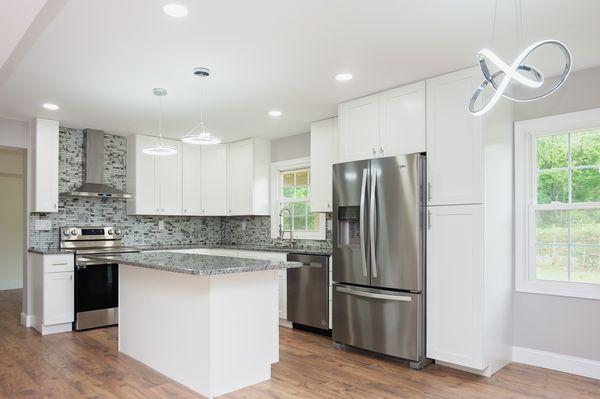 For a beautiful modern kitchen renovation, focus on sleek cabinetry and minimalist designs. Incorporate high-quality materials such as quart