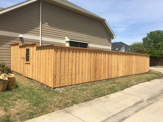 6ft. board on board western red custom cedar fence with a decorative gate insert.
Frisco, TX