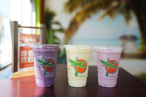 Three smoothies posting for a real photo