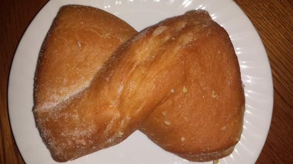 I'm not sure what this twisty thing is, but it's AWESOME.  Very simple: a light, fluffy bread coated in sugar--that's it.