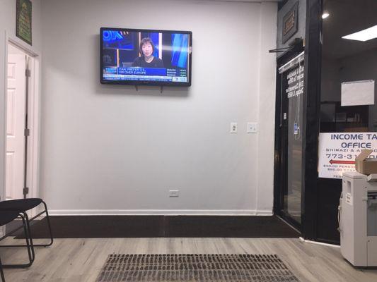 Really nice brand new office waiting room with a flat screen TV