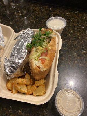 Generous portion of my Falafel Pocket with Tahini Sauce and batata (potatoes) on the side.