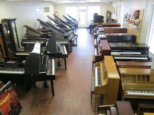 Pianos for sale - grand pianos, upright pianos, and digital/electric pianos.