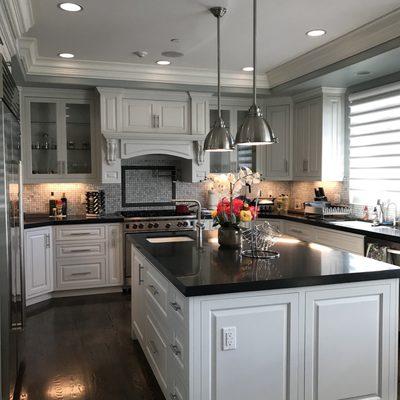 I love the hood over the stove!  The flush hinges are so classy.  Joe and Tina are amazing.