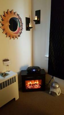 The cute fireplace in the massage room.